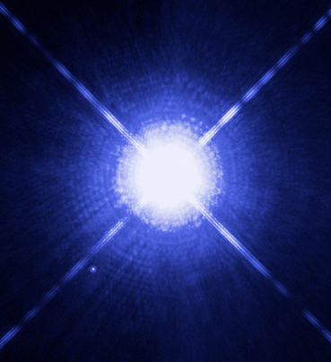Sirius A och Sirius B (vita pricken nere t v). Foto: HST/NASA/ESA