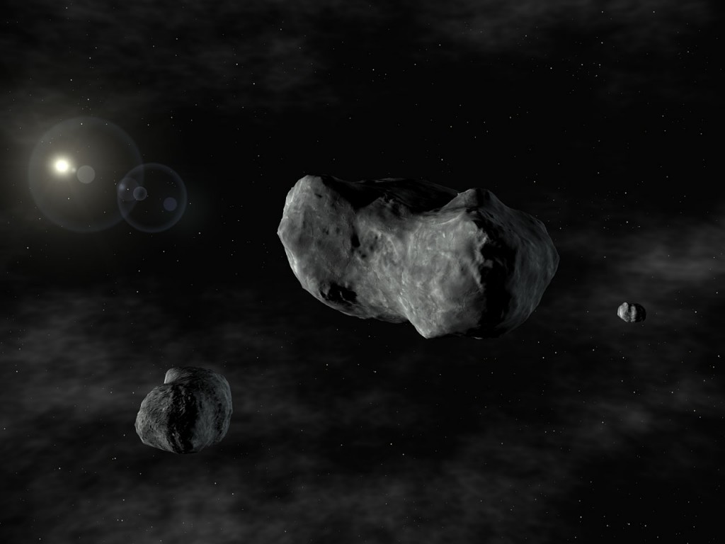 Rymdkonstnärens syn på Sylvia och asteroidmånarna Romulus och Remus. Ill: ESO