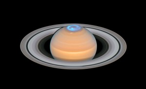 Saturn and its northern auroras (composite image)